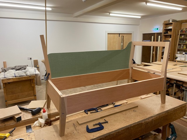 Workshop with wooden frame of the sofa