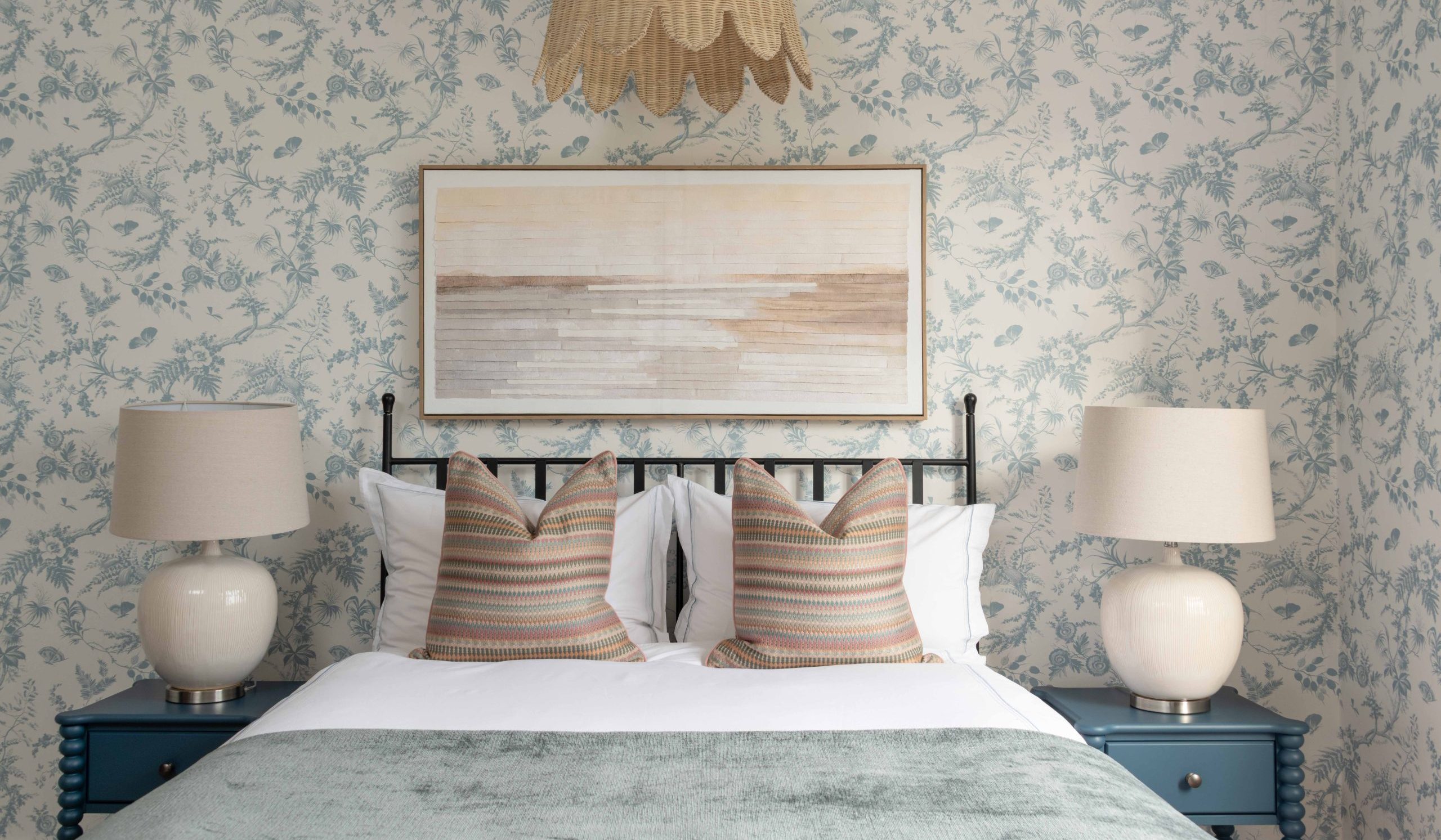 Daughter’s Bedroom with Floral Wallpaper and Blue Bedside Tables | The House Ministry Daughter’s bedroom with floral wallpaper, blue bobbin bedside tables and woven pendant light, designed by The House Ministry