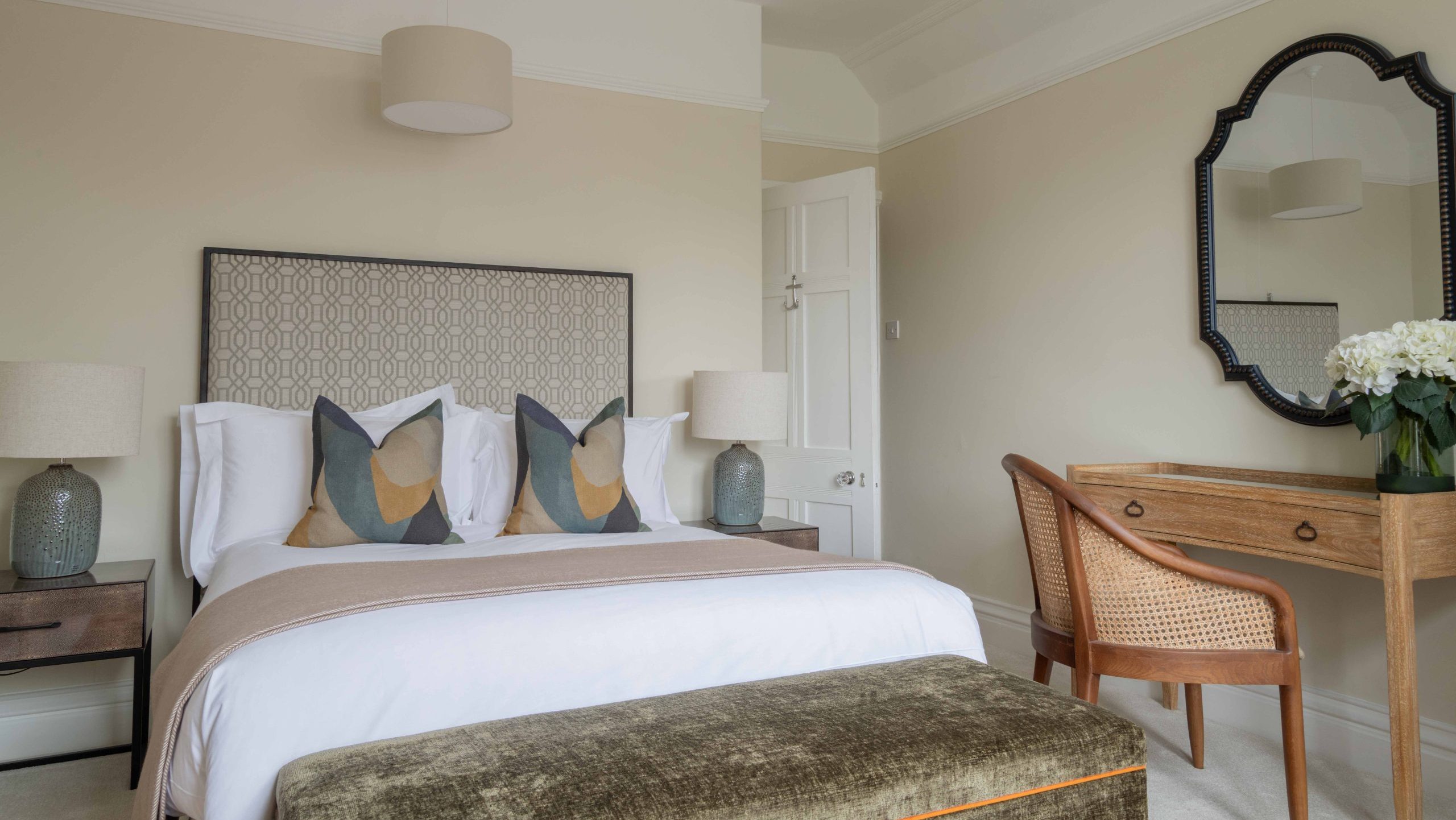After - Finished Son’s Bedroom with Upholstered Headboard | The House Ministry After - Completed son’s bedroom with upholstered headboard, dressing desk and velvet storage bench seat, designed by The House Ministry