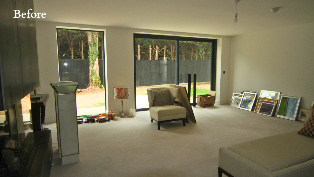 Before - Living Room Interior Before Renovation | The House Ministry Before - Empty living room mid-move, with bare walls, sliding doors and artwork stacked on the floor