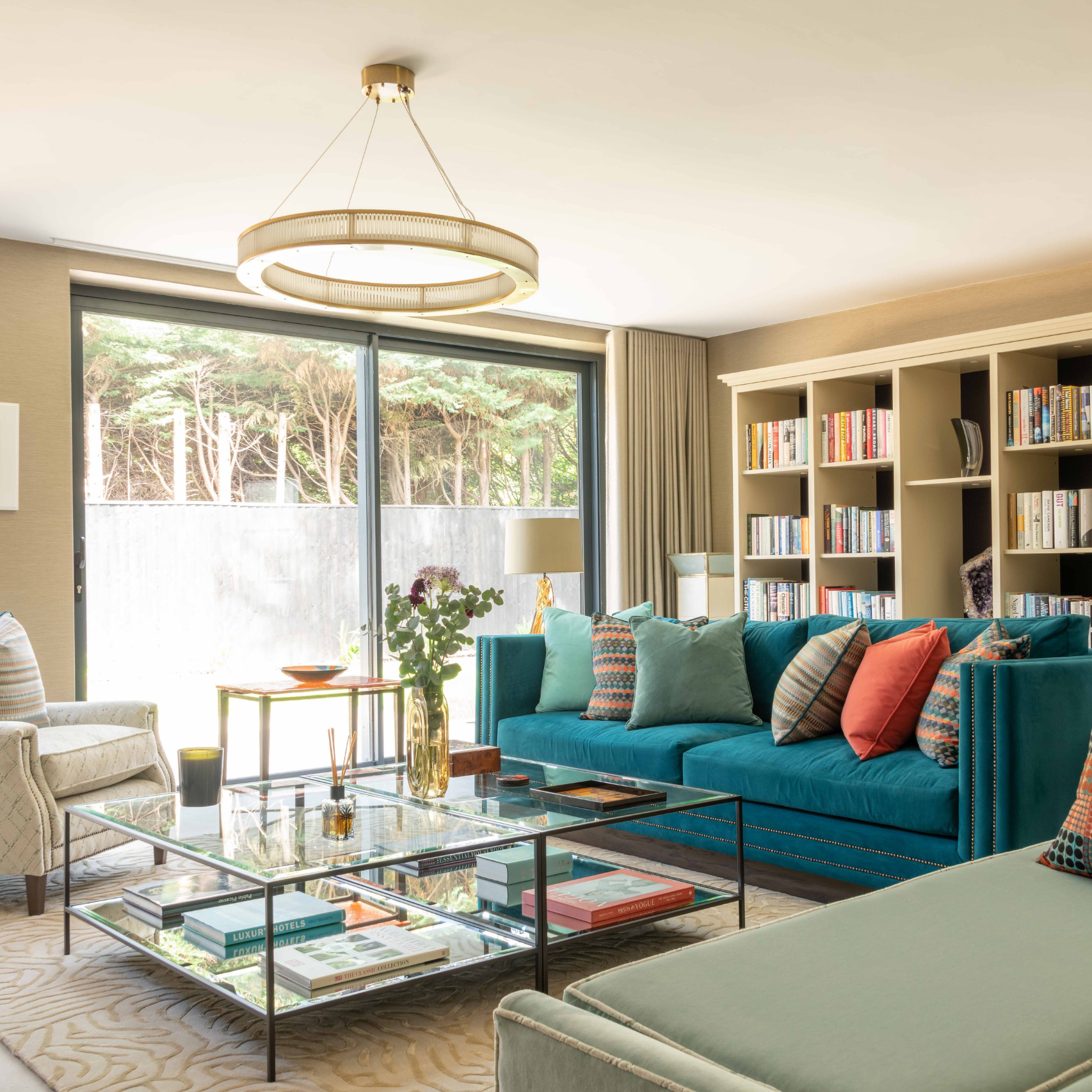 Luxury New Build Interior Design | The House Ministry Cotswold sitting room with bespoke joinery and upholstered furniture, interior design by The House Ministry