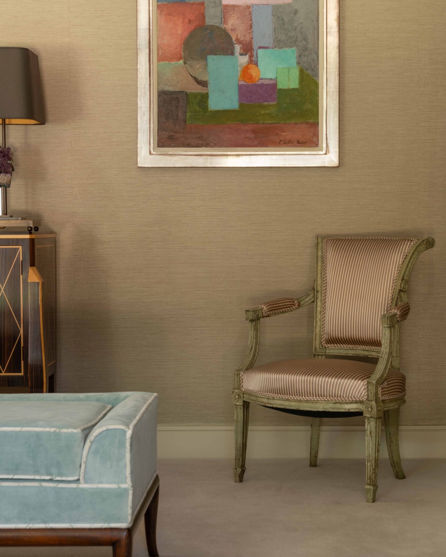 Artwork-Inspired Colour Scheme | The House Ministry Abstract geometric artwork in coral, teal, blue-grey and olive tones, hung above a striped armchair and powder blue sofa